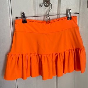 Neon orange tennis skirt